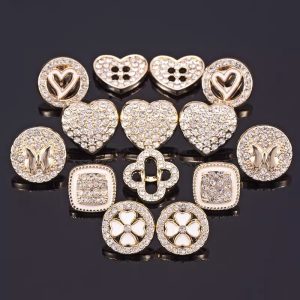 Assorted mini faux pearl and rhinestone buttons in various decorative designs with gold-tone metal, small sewing buttons for clothing and crafts