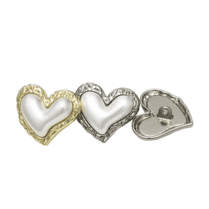 A pair of vintage heart pearl buttons in cream with a faux pearl finish and gold-tone edge