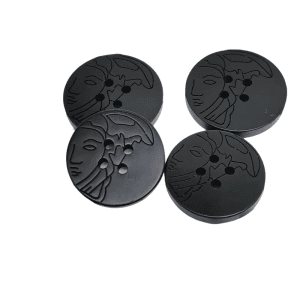 Black resin lady face buttons shown from the front with an embossed lady face design