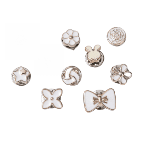 Enamel flower and bow no-sew modesty buttons in white and gold tones, pin-on buttons to prevent cardigan gaping