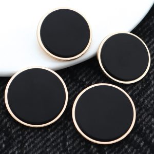Black and white vintage enamel buttons with gold-tone rims, round enamel shank buttons