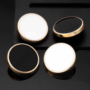 Vintage enamel buttons in black and white with gold and silver metal rims, round shank buttons for coats, suits and DIY sewing