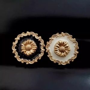 Sunflower buttons in black and white enamel with a sculpted gold metal sunflower and ornate vintage frame, shank back, metal buttons for coats and DIY sewing