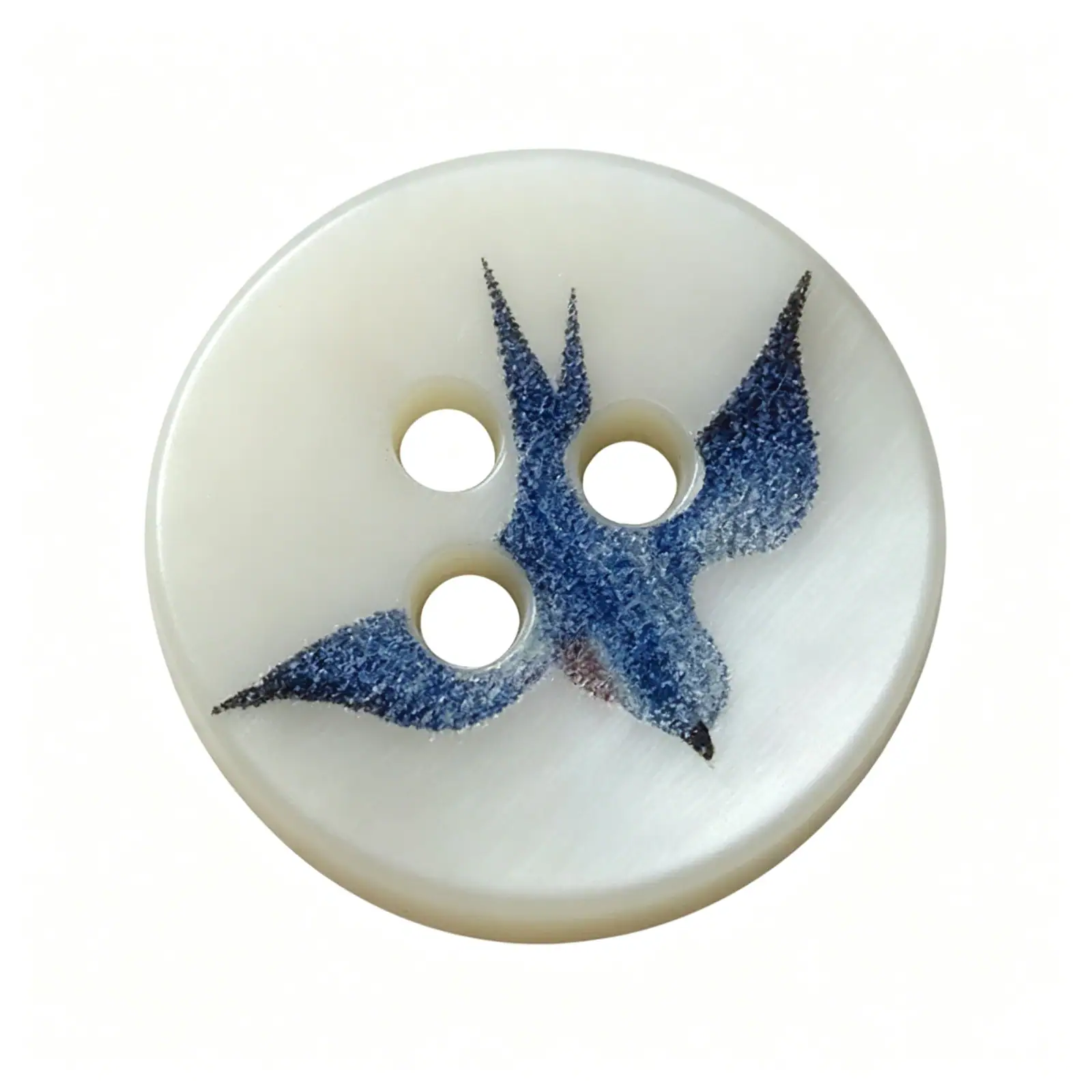 Single round shell button printed with a blue swallow in flight, with two holes set within the design