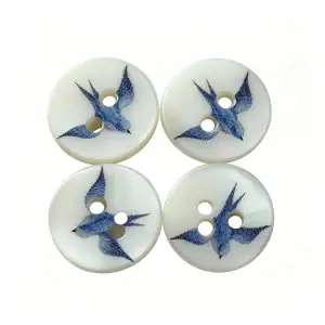 Four blue swallow shell buttons arranged in a square, showing the printed bird design at different angles
