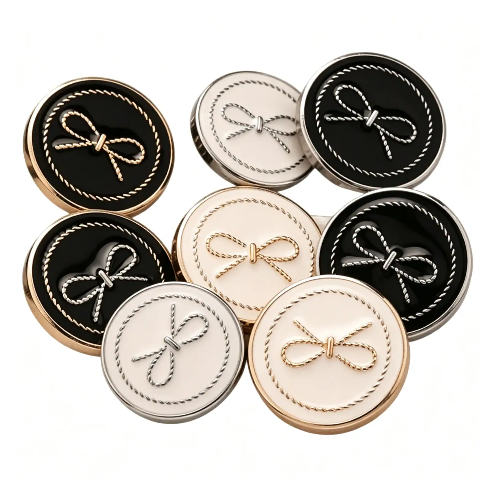 Group of round bow enamel buttons with metal frames in black and cream, with gold-tone and silver-tone rope bow motifs