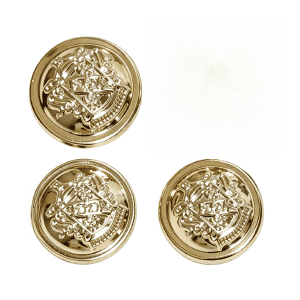 Gold blazer buttons with a raised heraldic crest and beaded rim, lightweight gold-tone sew-on buttons shown up close for blazers and coats