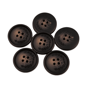 Dark brown resin leaf pattern buttons grouped together with an embossed leaf pattern