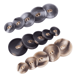 Patterned resin buttons with a gold center grouped in dark marbled tones