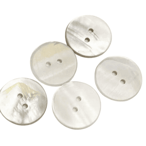 Shell buttons in natural white, round two-hole and four-hole buttons with a mother-of-pearl sheen