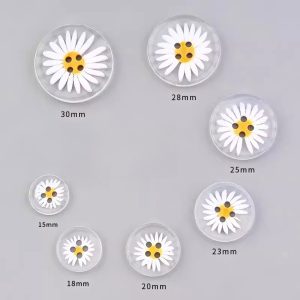 Seven clear resin daisy buttons arranged in a curve with size labels from 15mm to 30mm, each with a raised white daisy and yellow four-hole centre