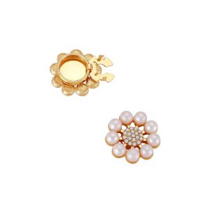 Pearl sunflower button covers clipped onto a white shirt cuff, faux pearls with a rhinestone center, snap-on, no sewing