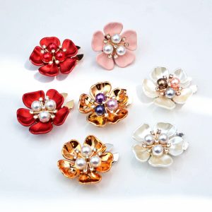 Colorful alloy flower button covers with a faux pearl and rhinestone center in gold, pink, red and white, snap-on, sold as a pair