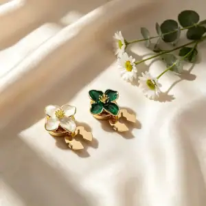 Enamel flower button covers on cream satin with daisies and eucalyptus