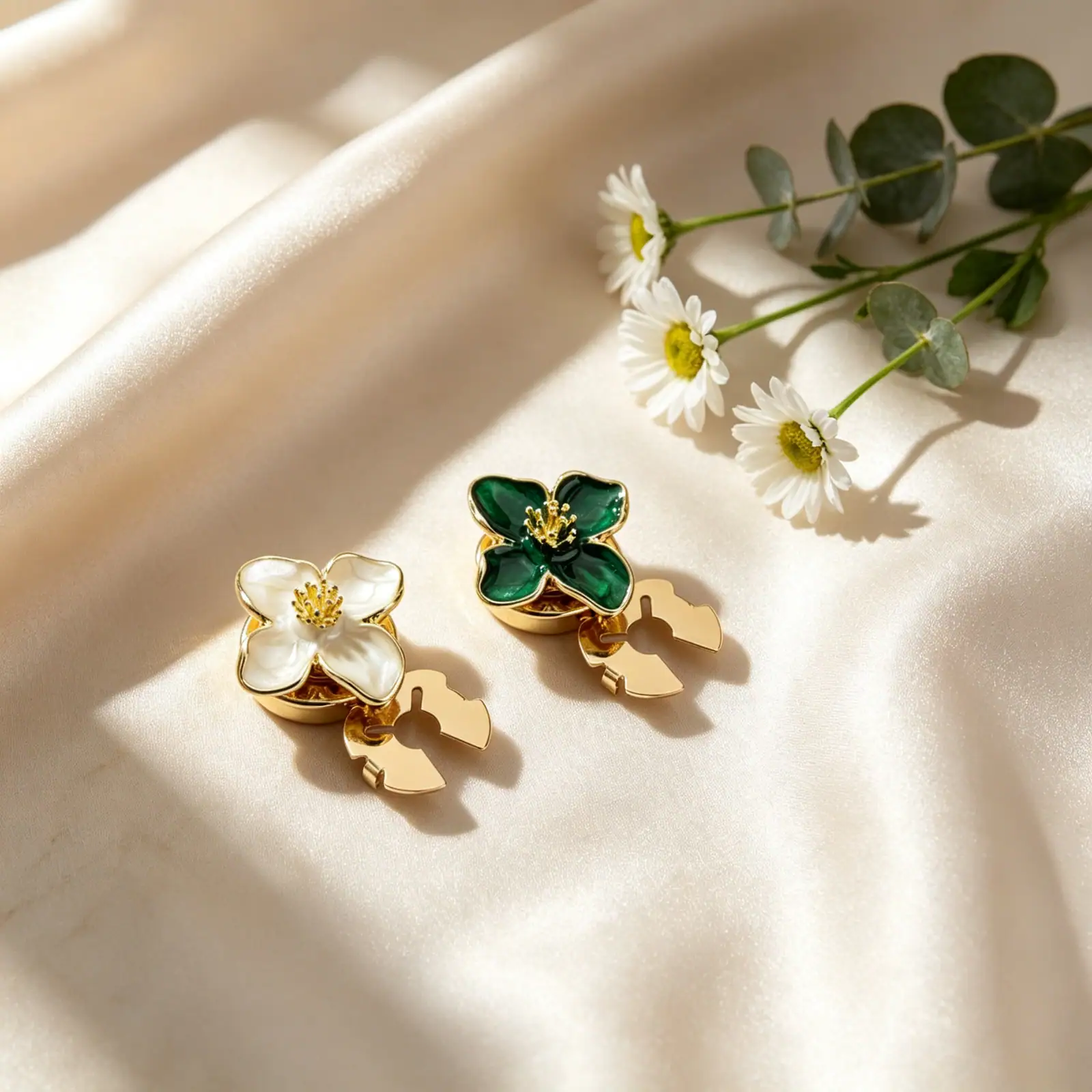 Enamel flower button covers on cream satin with daisies and eucalyptus