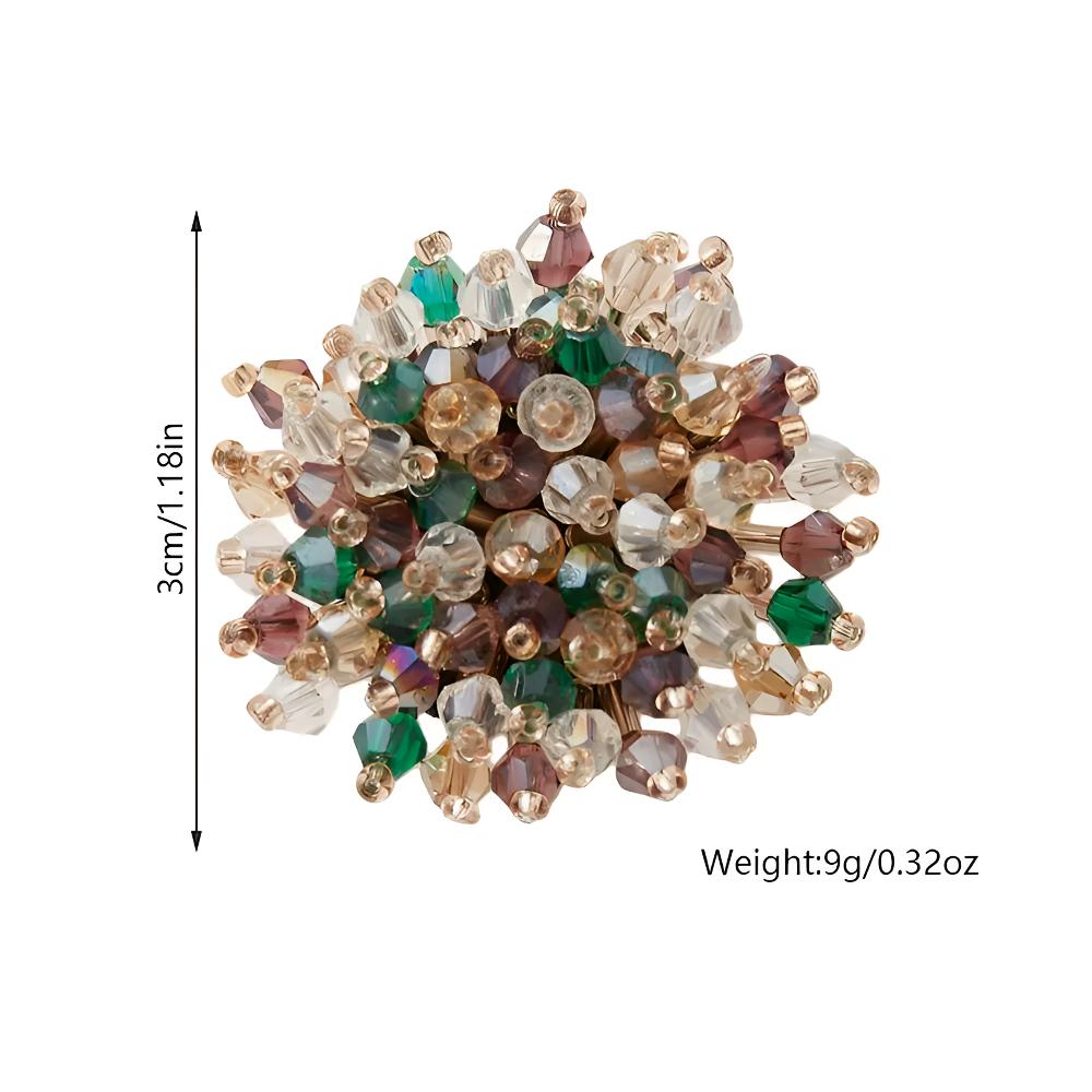 Iridescent cyan French cuff flower button cover, soft pearl-look iridescent enamel flower with faceted bead accents on a silver-tone metal base, close-up with size detail