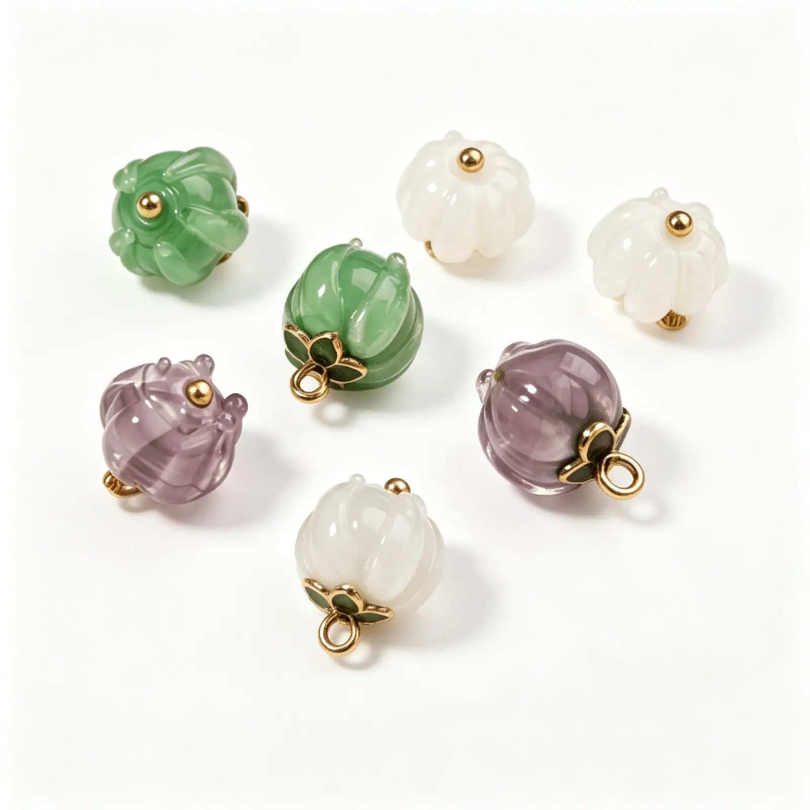 Fluted glass-look buttons in green, white and lilac with gold-tone caps