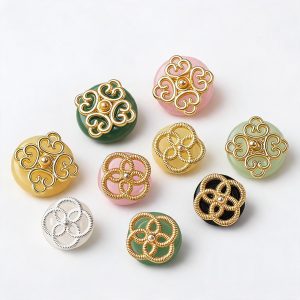 Jade filigree buttons shown front and back, faux jade glass domes with gold-tone metalwork and shank loops on the back, in green, pink, yellow, white and black