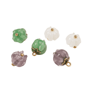 Group of lily of the valley glass buttons in white, purple and green, handmade ribbed flower buds with gold-tone loops and a green leaf detail, approx. 12mm