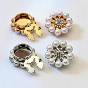 Pearl sunflower button covers with a rhinestone center in gold-tone and silver-tone, snap-on, sold as a pair