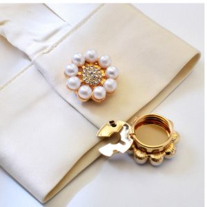 Gold-tone pearl sunflower button cover with a rhinestone center, snap-on