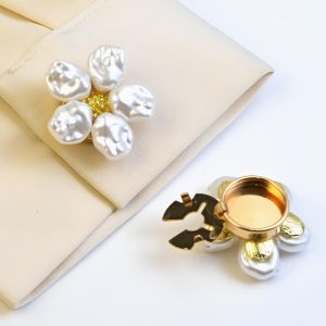 Faux pearl flower button covers on a beige cloth, sold as a pair