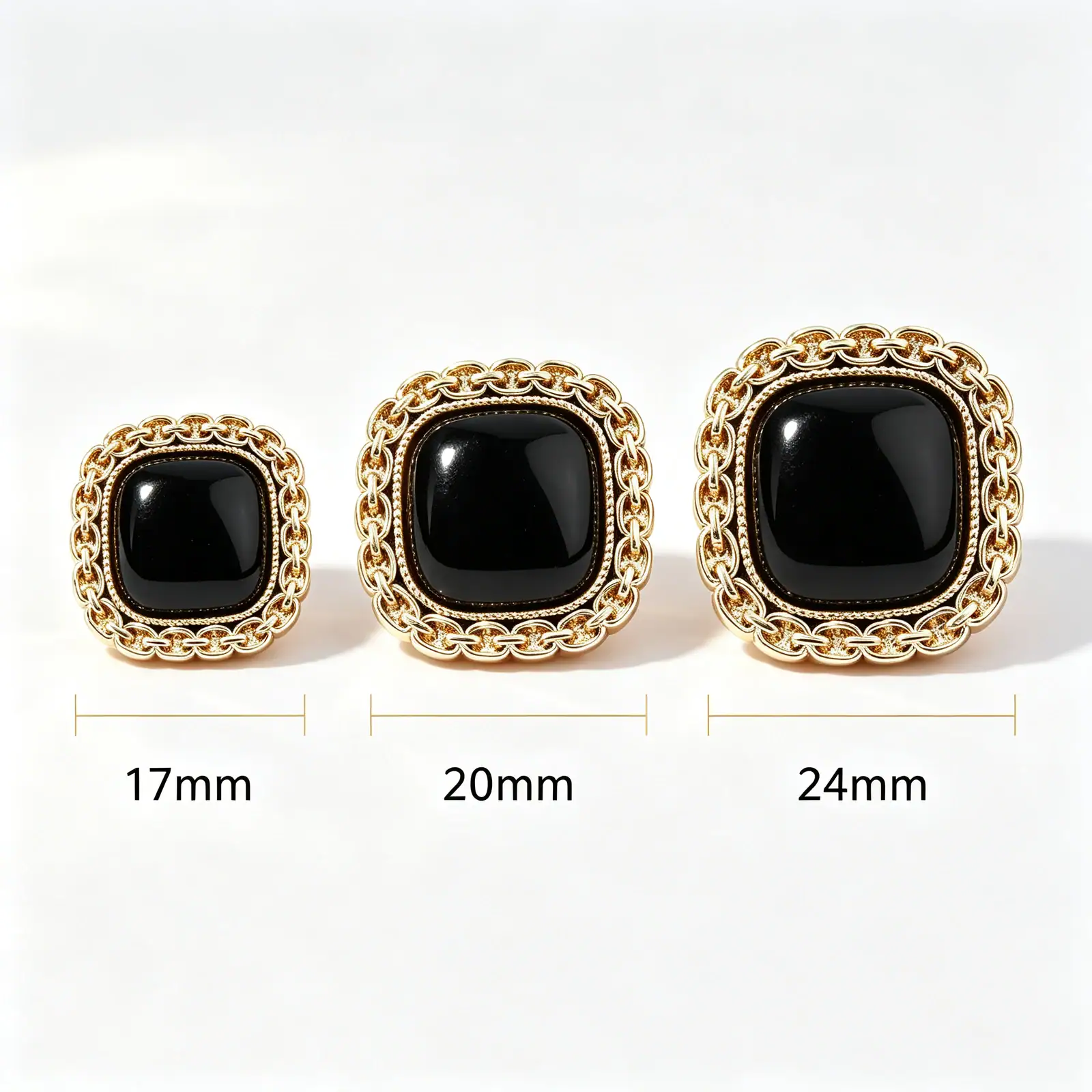 Size comparison of black square chain link buttons in 17mm, 20mm and 24mm, each with a gold-tone chain-link rim